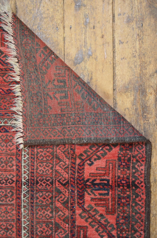 A worn Afghan rug, the central reserve w - Image 2 of 2