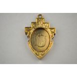 A Victorian yellow gold pendant engraved