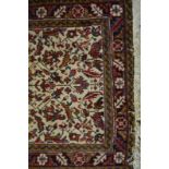 A Persian Brojerd rug with floral design