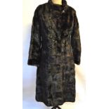 A dark brown mink fur coat, 46 cm across