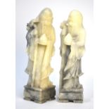 A pair of soapstone figures; each one carved as Shoulao,