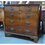 An 18th century crossbanded walnut chest of two short over three long graduated drawers,