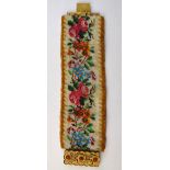 A Victorian beaded bracelet of flower and vine motif, on gilt metal snap,