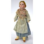 A French Unis 00 small bisque-headed girl doll with red wig,