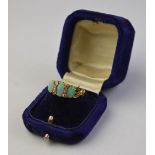 A three stone oval opal and diamond ring having eight-cut diamonds between,