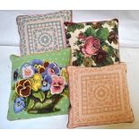 Two floral wool tapestry cushions and two floral patterned wool tapestry cushions (4)