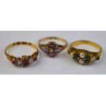 Three Victorian cluster rings, one set emeralds and half pearls, one mauve paste and half pearl,