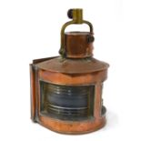 A copper ship's bow-light with port and starboard lens and original spirit lamp,