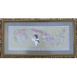 A Chinese rectangular textile depicting the Daoist theme of a Crane standing beside a pine tree,