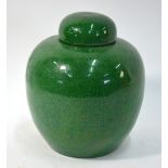 A green monochrome, Chinese oviform vase with domed cover en-suite,