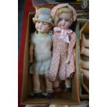 A Simon & Halbig 1909 2/0 bisque-headed girl doll with blond wig,