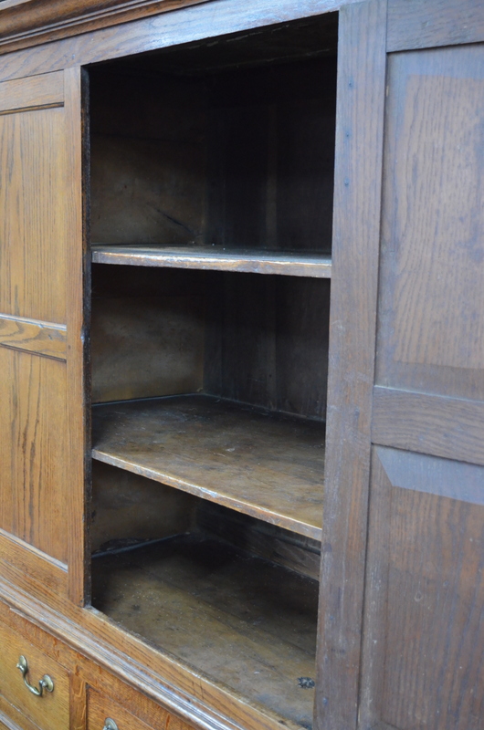 An 18th century oak country housekeepers cupboard in two parts, - Image 5 of 8