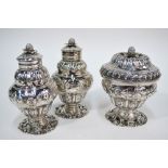 An early George III silver set of three silver caddies,