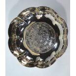 A heavy quality planished silver bowl of lobed form,