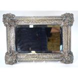 A 19th century heavy quality electroplated wall mirror frame, richly cast with floral,