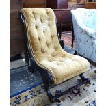 A Victorian aesthetic period ebonised and parcel gilt framed button upholstered nursing chair