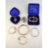 A collection of various paste items including Victorian linked buttons, early 20th century buckle,