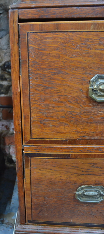 An unusual Georgian oak chest of two short and five long drawers with rosewood crossbanded fronts, - Image 3 of 5