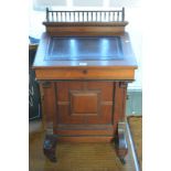 A late 19th century red walnut Davenport,