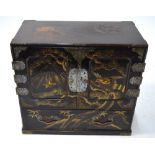A kuro-nuri Japanese chest with hinged doors opening to reveal an arrangement of six drawers