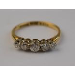 A five stone old cut diamond ring, 18ct yellow gold with white gold claws, approx 0.