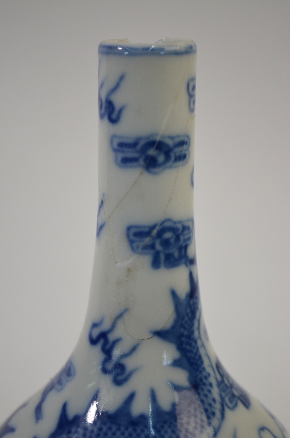 A Chinese famille rose vase with trumpet neck and underglaze blue design, - Image 6 of 12