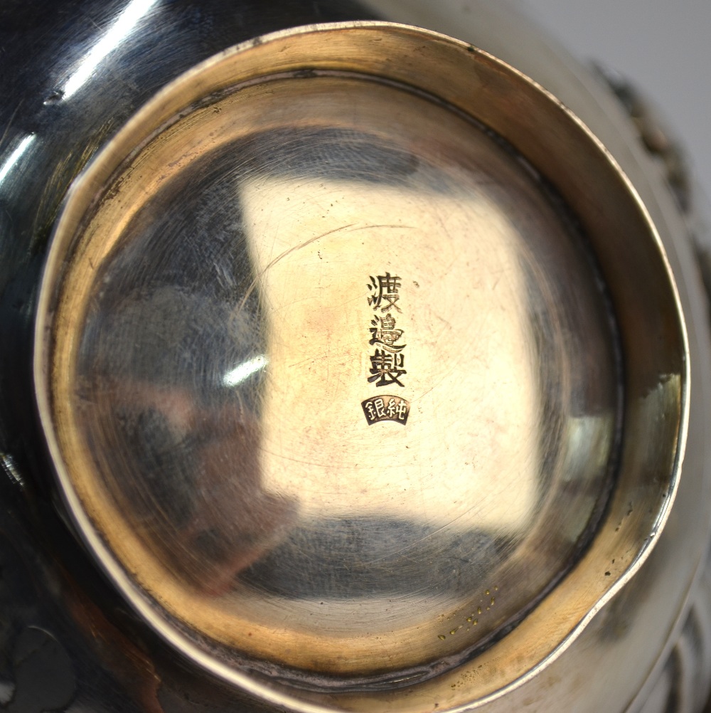 A Japanese white metal bowl, decorated on the exterior with a floral design; 13cm diameter, - Image 4 of 7