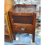 A 19th century mahogany tray top step commode/night stand with tambour door