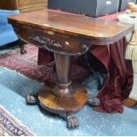 A Regency rosewood demi-lune fold over card table, the interior with baize lined circle,