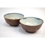 An associated pair of cafe-au-lait and underglaze blue, Chinese bowls,