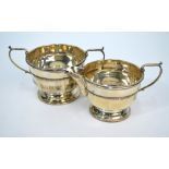 A silver cream and sugar pair on raised foot rims, Selfridge & Co. Ltd., Birmingham 1933, 6.