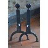 An antique cast and wrought iron adjustable cauldron-suspender,