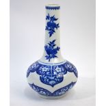 A Chinese blue and white vase with long neck and squat,