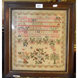 An early Victorian needlework sampler, worked with alphabets and numbers, flying figures,