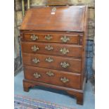 A small George III mahogany bureau,