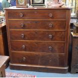 A large Victorian gentleman's mahogany five long drawer chest of drawers each with turned wooden