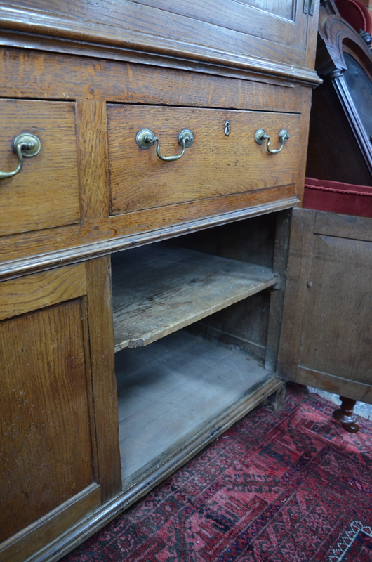 An 18th century oak country housekeepers cupboard in two parts, - Image 8 of 8