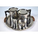 A 1960s Danish Stelton stainless steel four piece coffee service, designed by Arne Jacobsen,