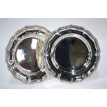 A pair of epns dishes of roseate form, with gadrooned rims and engraved with stag crests,