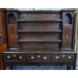 An 18th century style crossbanded oak high dresser,