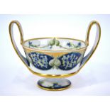 A James Macintyre & Co twin handle pedestal bowl designed by William Moorcroft,