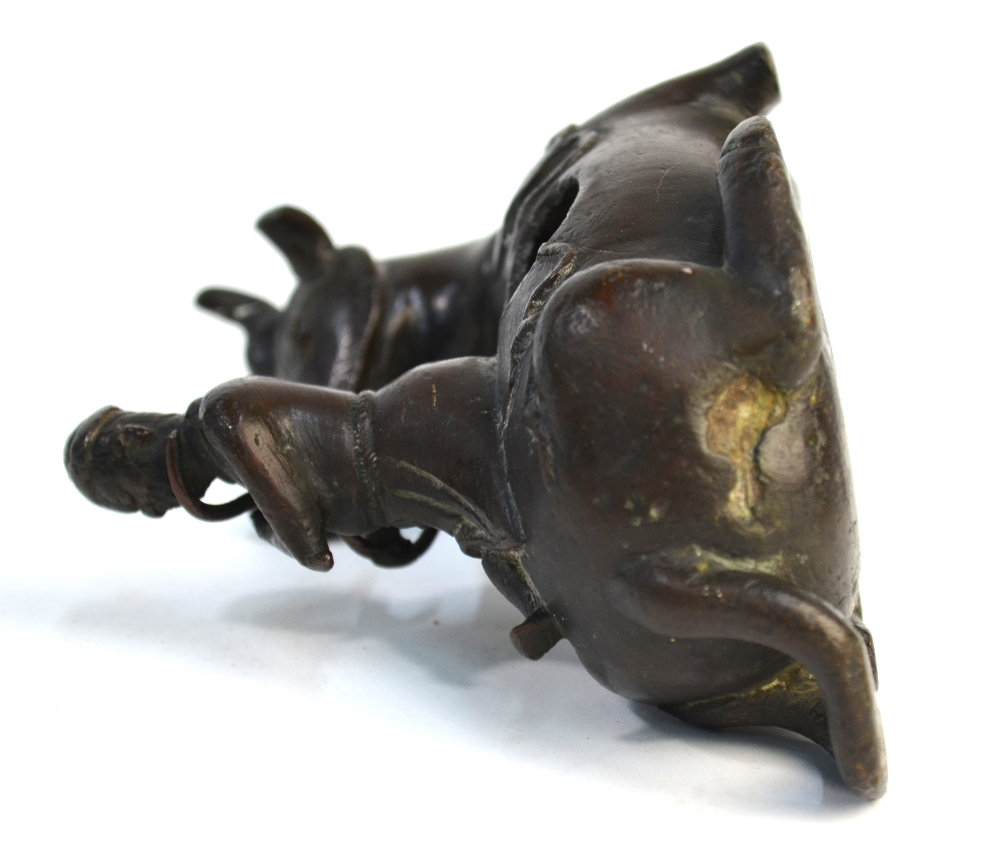 A Chinese bronze figure of a scholar seated on a recumbent buffalo, possibly a mirror stand, - Image 6 of 6
