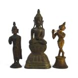 Three Asian metal sculpture, comprising: a standing figure of Krishna, playing the Divine Flute,