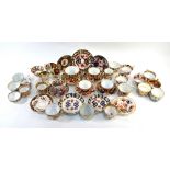 A 19th century Staffordshire collection of twenty-eight cups and eleven saucers and a tea plate,