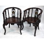 A pair of antique Chinese hardwood horseshoe-back chairs,
