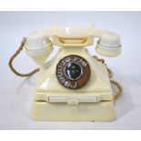 A 1940s vintage cream plastic telephone and bell-unit (2) Condition Report very good
