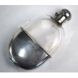 A glass hip-flask with hinged bun stopper and detachable beaker, A & J Zimmerman Ltd.