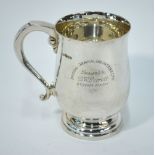 A silver baluster pint mug with scroll handle and raised moulded foot, James Dixon & Sons,
