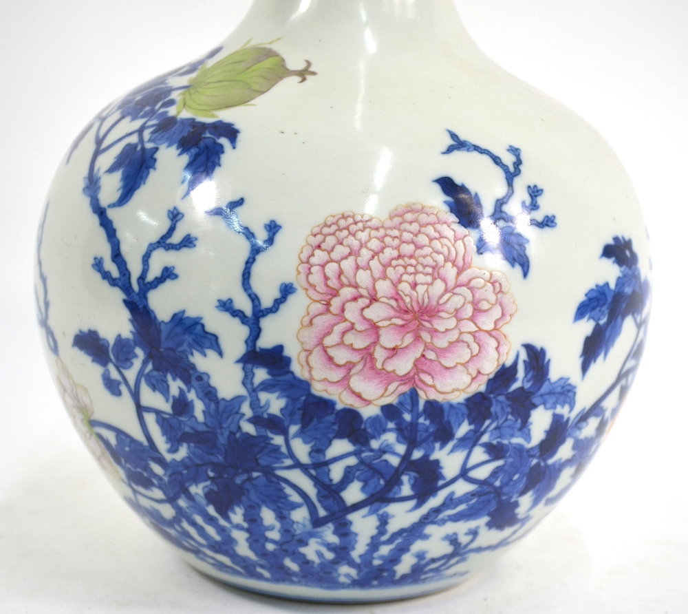 A Chinese underglaze blue and famille rose decorated vase with cylindrical neck and oviform body; - Image 5 of 8