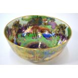 A Wedgwood Fairyland lustre bowl decorated externally with the 'Woodland Bridge' pattern and